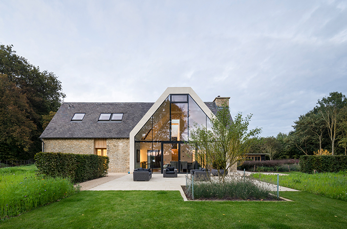 Large country house with fully glazed gable wall