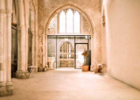 Entrance of a church with structurally glazed internal lobby