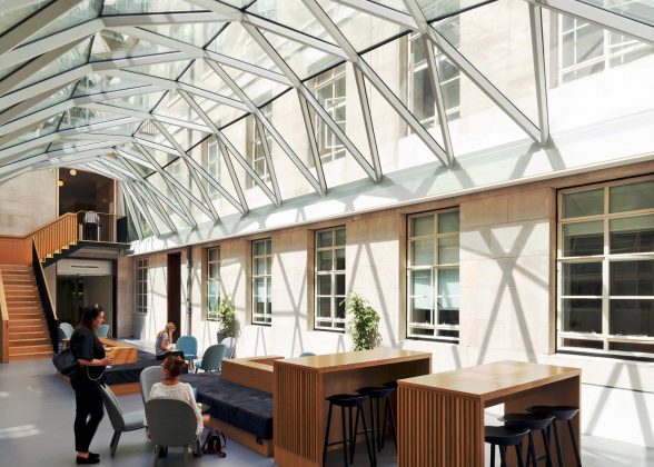 Glass atrium roof over an open-plan study area